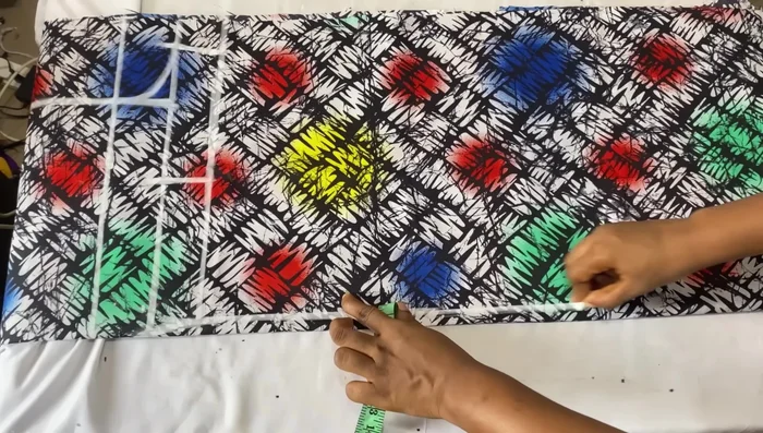 Mark the dart (4 inches from center front, down 5 inches). Connect to form a dart.