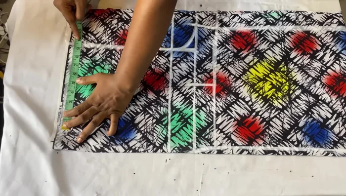 Mark the dart (4 inches from center front, down 5 inches). Connect to form a dart.