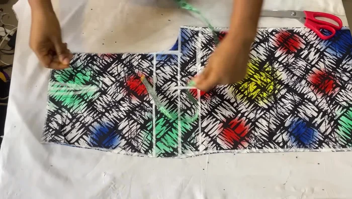 Remove the waistband (2 inches) from the top of the front panel. (Alternative: cut out the waistband allowance after taking other measurements)