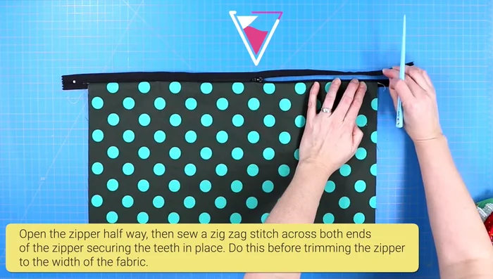 Secure zipper ends with a wide zigzag stitch to prevent teeth from separating. Trim excess zipper.