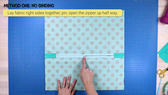 Assemble pillow: Lay both panels right sides together, clip, sew a 1/2 inch seam allowance around the edges, clip corners, and turn right side out.