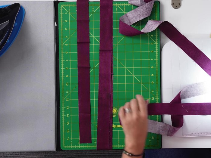 Border Application: Sew border strips end-to-end, adding border extensions. Sew borders to the quilt top, pressing seams open and trimming excess fabric.