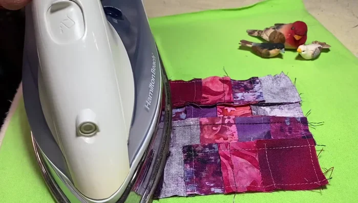 Trim the corners of the patches to make them lay flat.