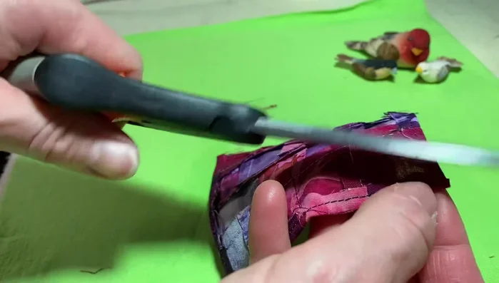 Trim the corners of the patches to make them lay flat.