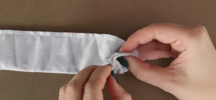 Press the belt flat and topstitch around the perimeter (except the open end) using a contrasting thread.