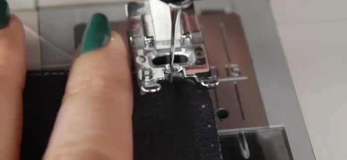 Baste across the open end at ¼-inch mark. Mark a fold line 1.5 inches from the edge.