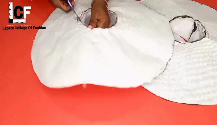 Trim excess fabric from the seam allowance to reduce bulk.