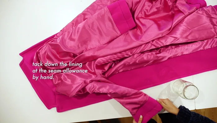 Remove the washable marker, and tuck and hand-stitch the lining at seams as needed.