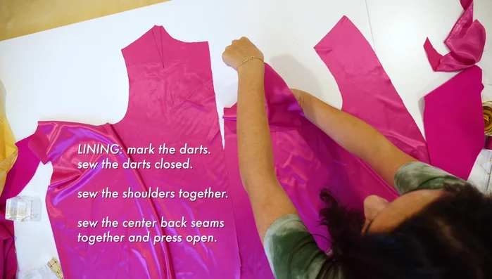 Sew shoulder seams of the facing at a ½ inch seam allowance.