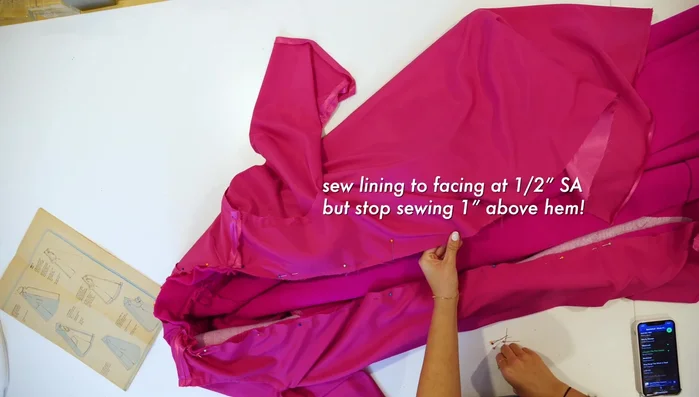 Fold raw edge down ¼ inch and slip stitch the hem.