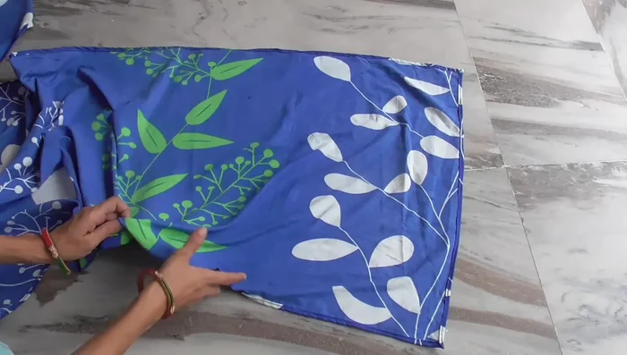 Stitch the two pieces together from all four sides, right sides facing in. This creates the main body of the bag with pockets.