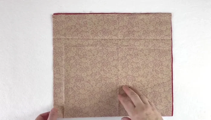 Sew top seam: Pin and sew the top seam of one outer and one inner fabric piece, right sides together. Repeat for the other two pieces.