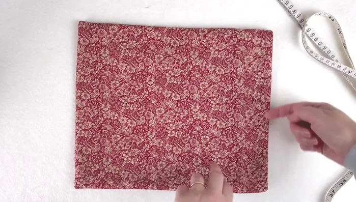 Stitch drawstring channels: Sew three lines of stitching around the bag: one close to the edge, one 5cm from the edge, and one 7cm from the edge (adjust distances for small and large bags).