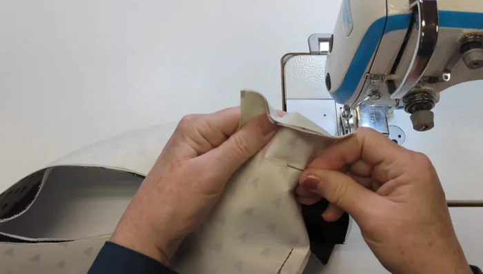 Finish and topstitch brim edges.