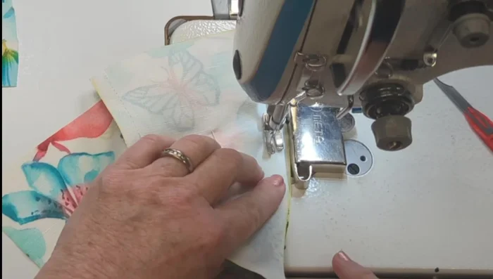 Sew two three-piece panels together.