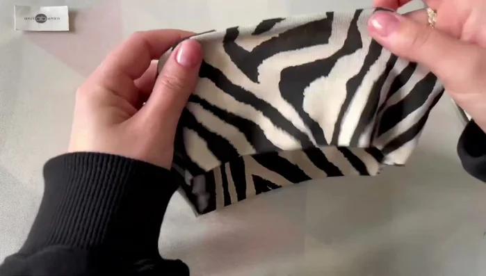 Iron the headband flat, with the long seam on top.