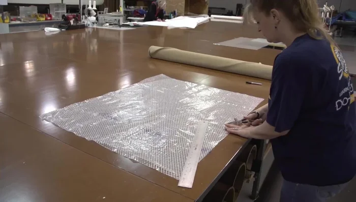 Cut foam to the size of the seat bottom, adding extra for a more attractive look.