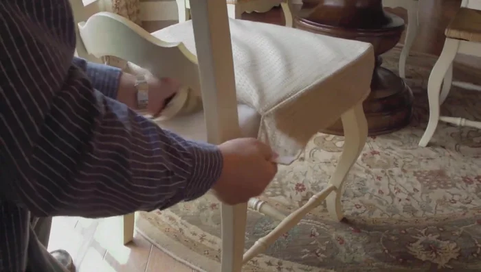 Install the cover on the chair and secure with velcro.