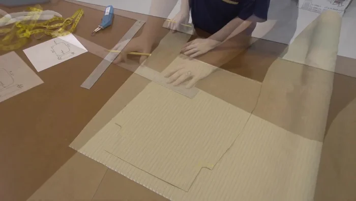 Sew boxing strips to the top fabric piece. Use a hot knife to prevent unraveling.