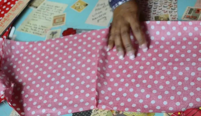 Pin the fourth side together (right sides together), ensuring hems align. Sew a straight stitch.