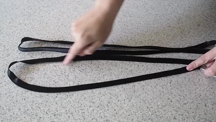 Sew belt pieces together: Place right sides of both fabric pieces together, stitch with piping foot through all layers.