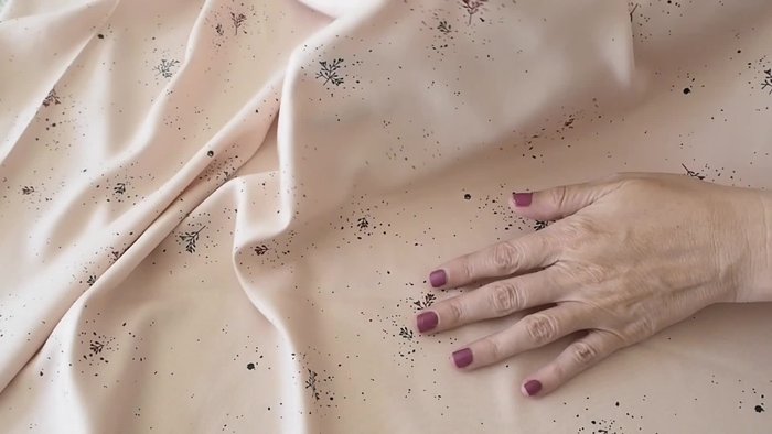 Add interfacing: Apply press-on cotton interfacing to both fabric pieces for structure.