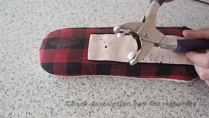 Add eyelets: Attach eyelets using the provided tool and pliers.