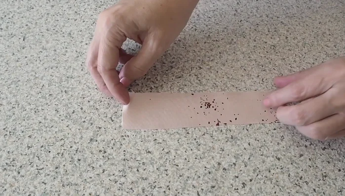 Make belt loops: Cut fabric strips, add interfacing, fold, stitch, turn right side out, and press. Stitch completed loops to the belt.