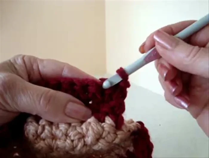 For the last row, skip a stitch at the beginning and end, slip stitch to join, and fasten off.