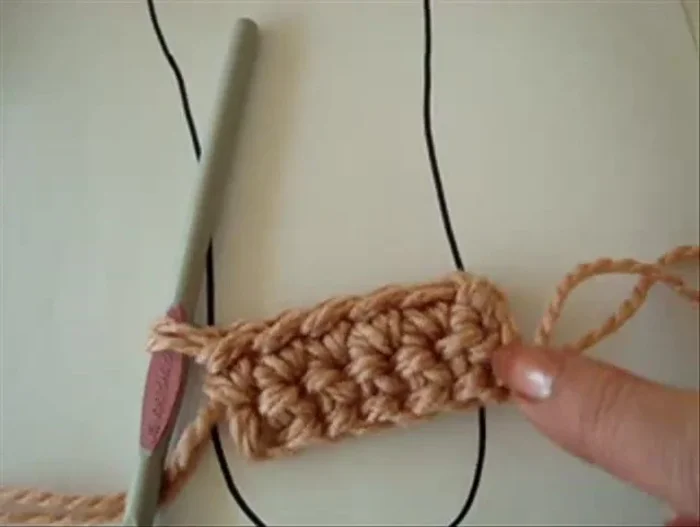Continue single crocheting until the rectangle is approximately the length of your foot sole.