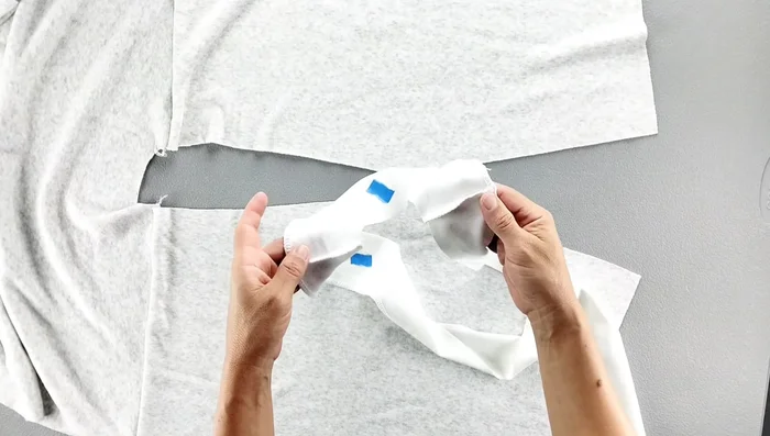 Press the facing seam allowance away from the garment and topstitch the seam allowance to the facing, about ⅛ inch from the original seam.