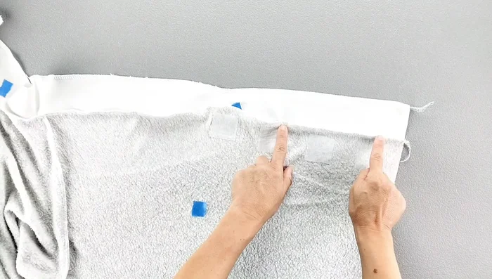 Press the facing seam allowance away from the garment and topstitch the seam allowance to the facing, about ⅛ inch from the original seam.