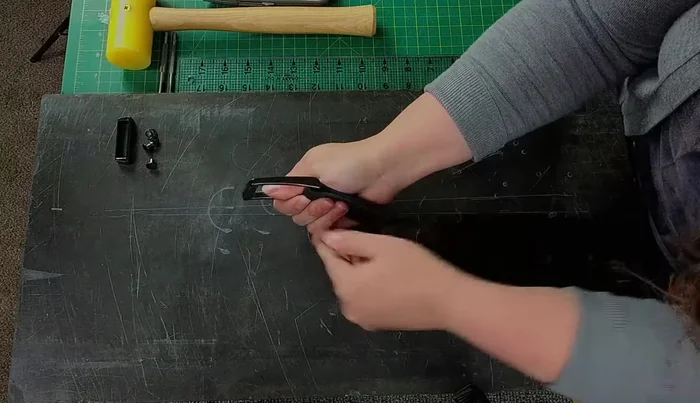 Add additional holes along the belt for adjustability. Use a template for consistent spacing or measure directly onto the user’s existing belt.