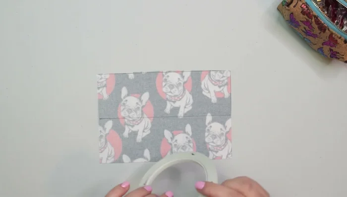 Prepare the loop: Draw a center line, fold edges to the line, press or use double-sided tape, fold in half, clip, press (optional), stitch both sides.