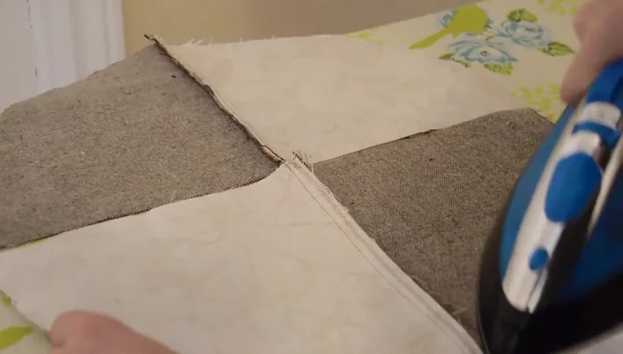 Join half-circles: Sew the two half-circles together, matching the middle points. Press for a crisp finish.