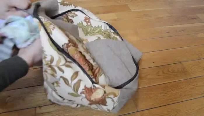 Stuff and finish: Turn the pouf inside out and stuff with fabric scraps.
