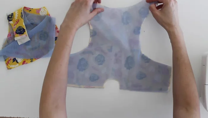 Fuse the power mesh to the wrong side of the outer fabric pieces.