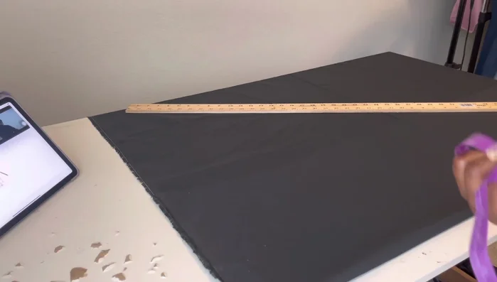 Cut out the bodice pieces, measuring and marking shoulder, neck, armhole, waist, and bust points. Add seam allowances.