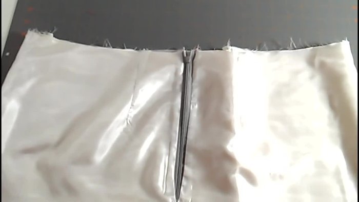 Prepare your skirt: Sew the center back seam, leaving an opening for the zipper. Finish the seam allowances (approximately 5/8 inch). Install a visible zipper; this provides more seam allowance for easier lining attachment.