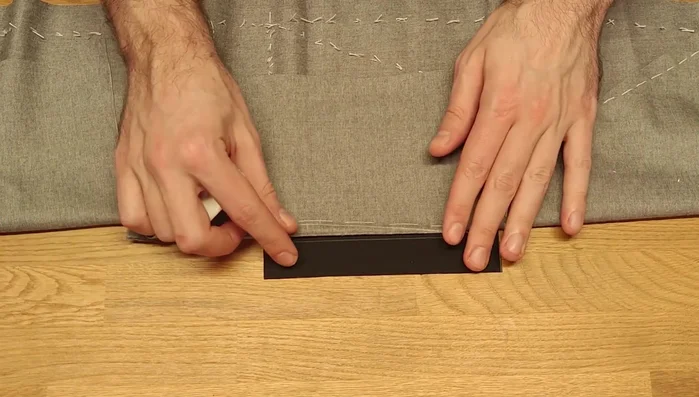 Position the stripe so the top is about 4cm above the dart point. Pin or baste.