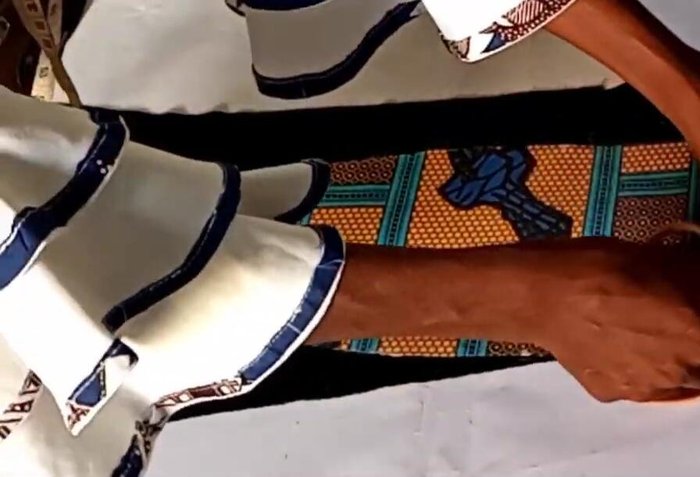 Iron the interfacing onto the wrong sides of both fabric pieces.