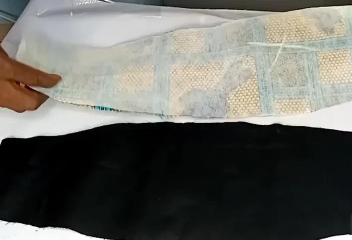 Iron the interfacing onto the wrong sides of both fabric pieces.