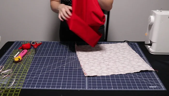 Pin and stitch along the top edge (1/8 inch seam).