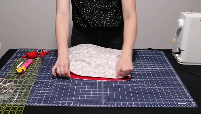 Pin and stitch along the top edge (1/8 inch seam).