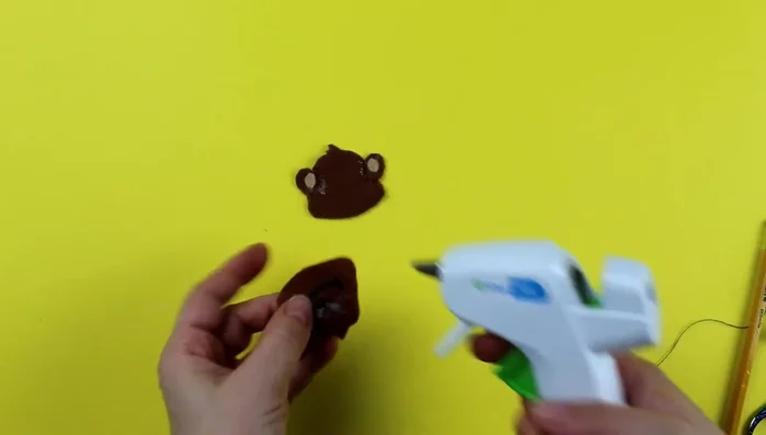 Sew around the headpiece, leaving a gap for stuffing. Use pins or glue to hold pieces together while sewing.