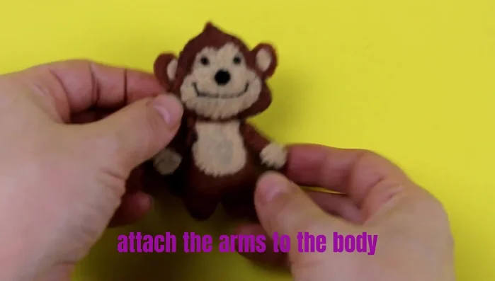 Attach arms to the body.