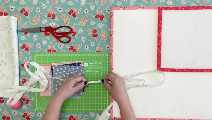 Create bias tape strip: Cut a 108-inch long fabric strip (about 1 1/8 inches wide). Moisten with a starch solution. Run through a bias tape maker to create a finished binding strip for the bunting.