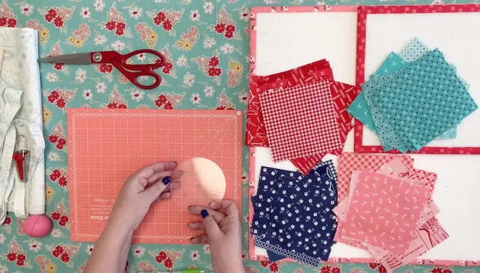 Pair and mark stitching lines: Place the marked square with its matching square, right sides together. Mark a stitching line along the traced half-circle using a pencil or other marking tool.