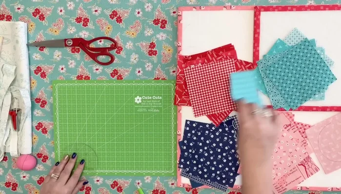 Pair and mark stitching lines: Place the marked square with its matching square, right sides together. Mark a stitching line along the traced half-circle using a pencil or other marking tool.