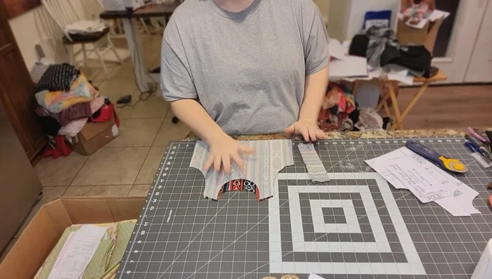 Sew shoulder seams of the front and back pieces together, right sides together. Use a serger or zigzag stitch.